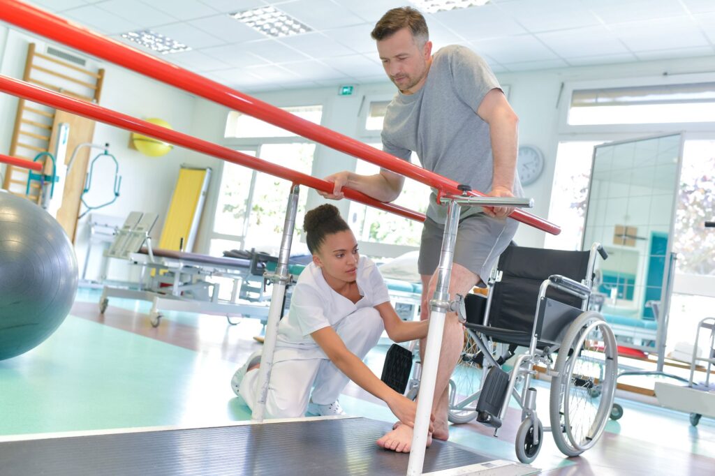 man walking at physical therapy