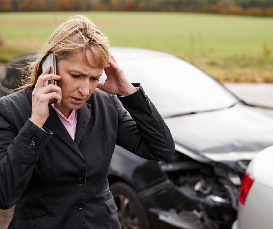 lady on phone after car accident