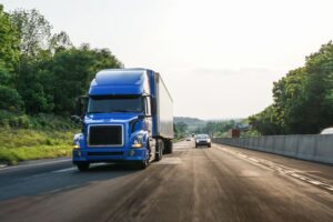 semi truck driving on road