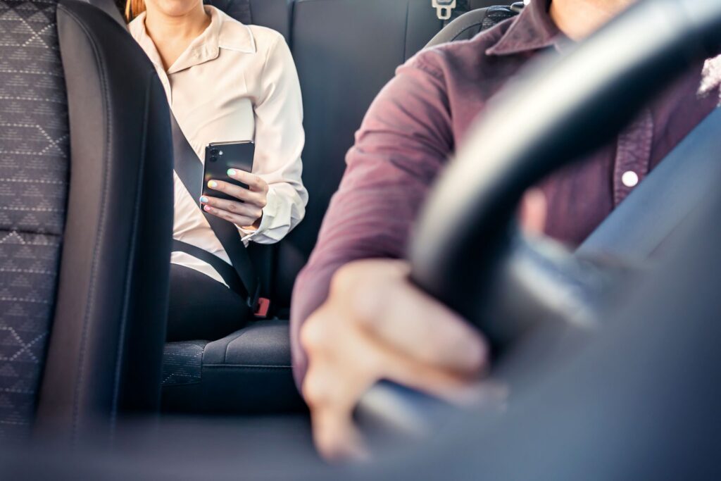 passenger riding in car
