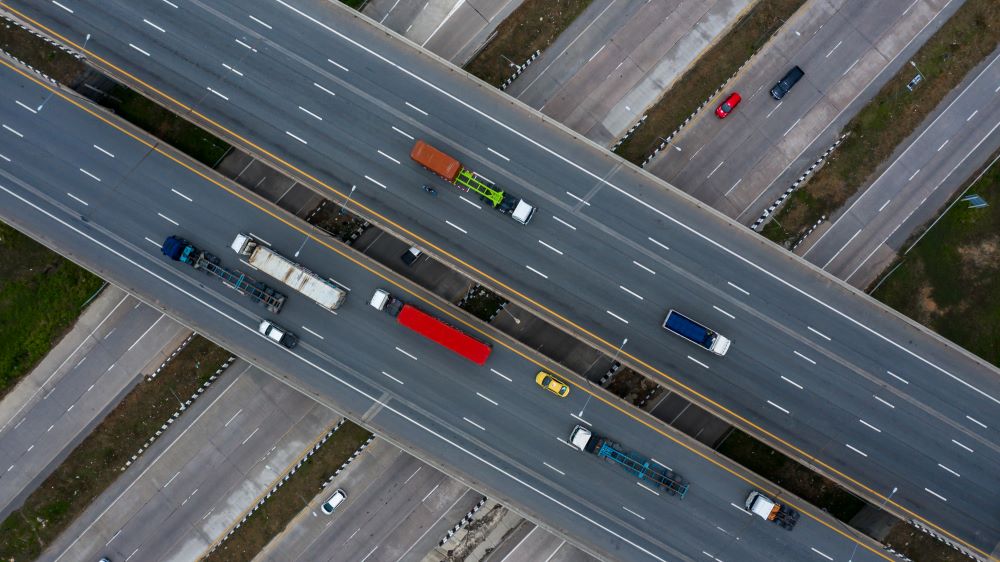 semi trucks on road aerial view