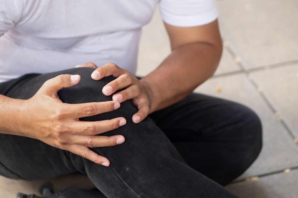 injured on floor holding knee